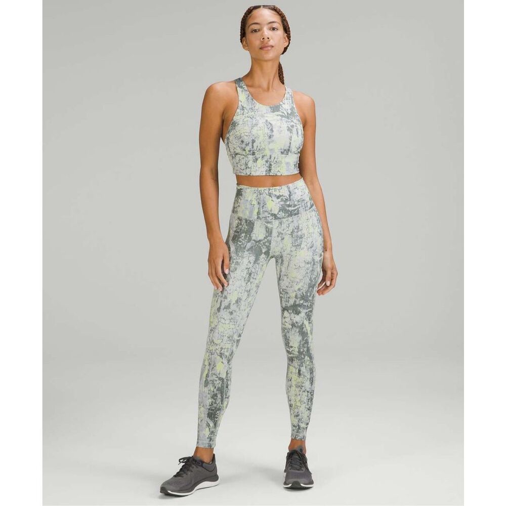Lululemon Wunder Train High-Rise Tights in a grey and yellow Cinder Grain Smoked